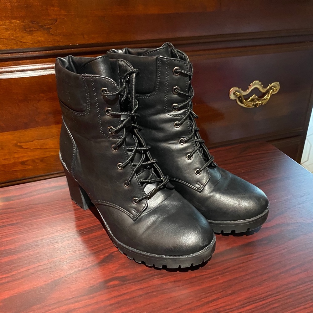 Black heeled combat boots